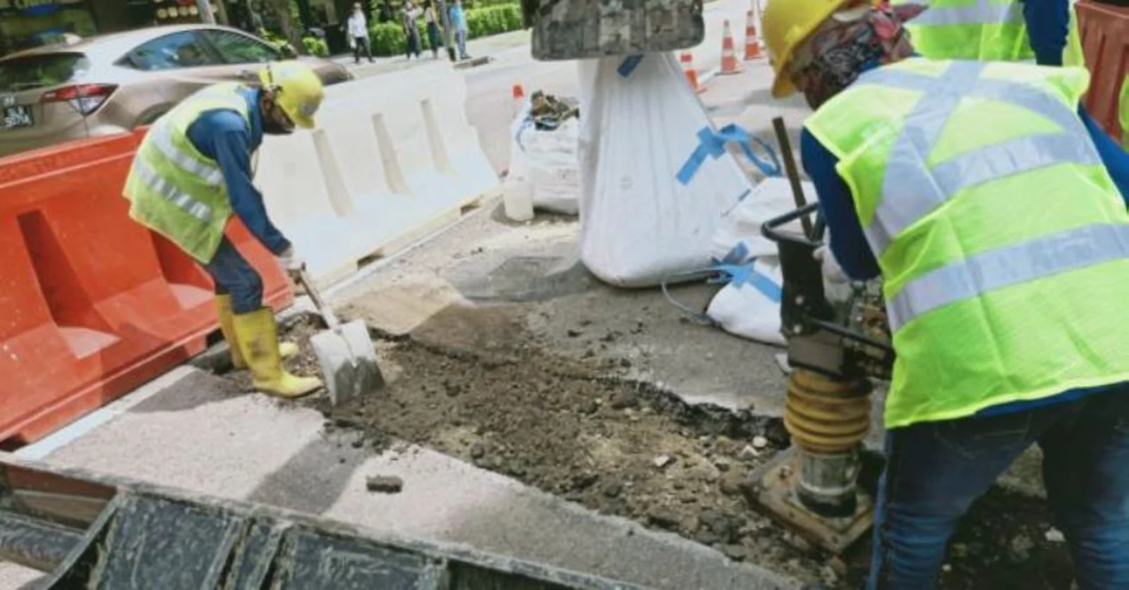 Figure 7: Backfilling the trial trenches