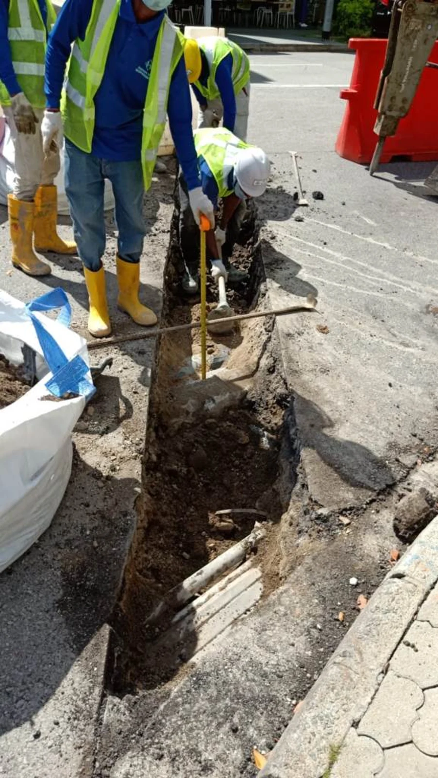 Figure 5: Manual Excavation to avoid damaging any existing cables or pipes.
