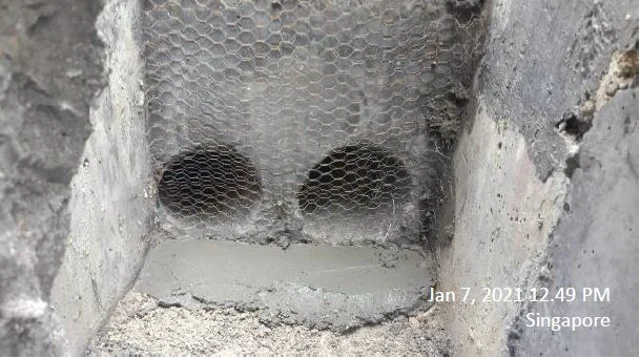 Figure 23: Casting of the concrete wall connecting the steel pipes to the drain