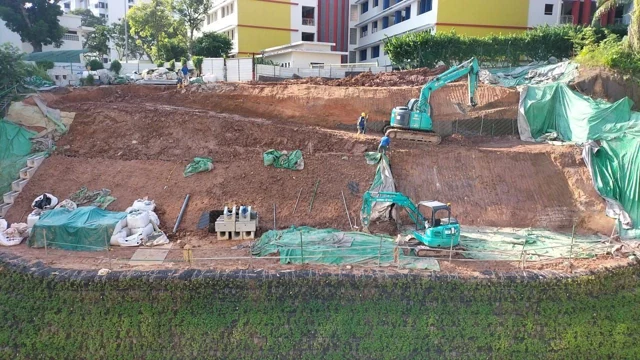 Figure 6: Excavators delivering materials from the crest of the slope to the respective working platforms