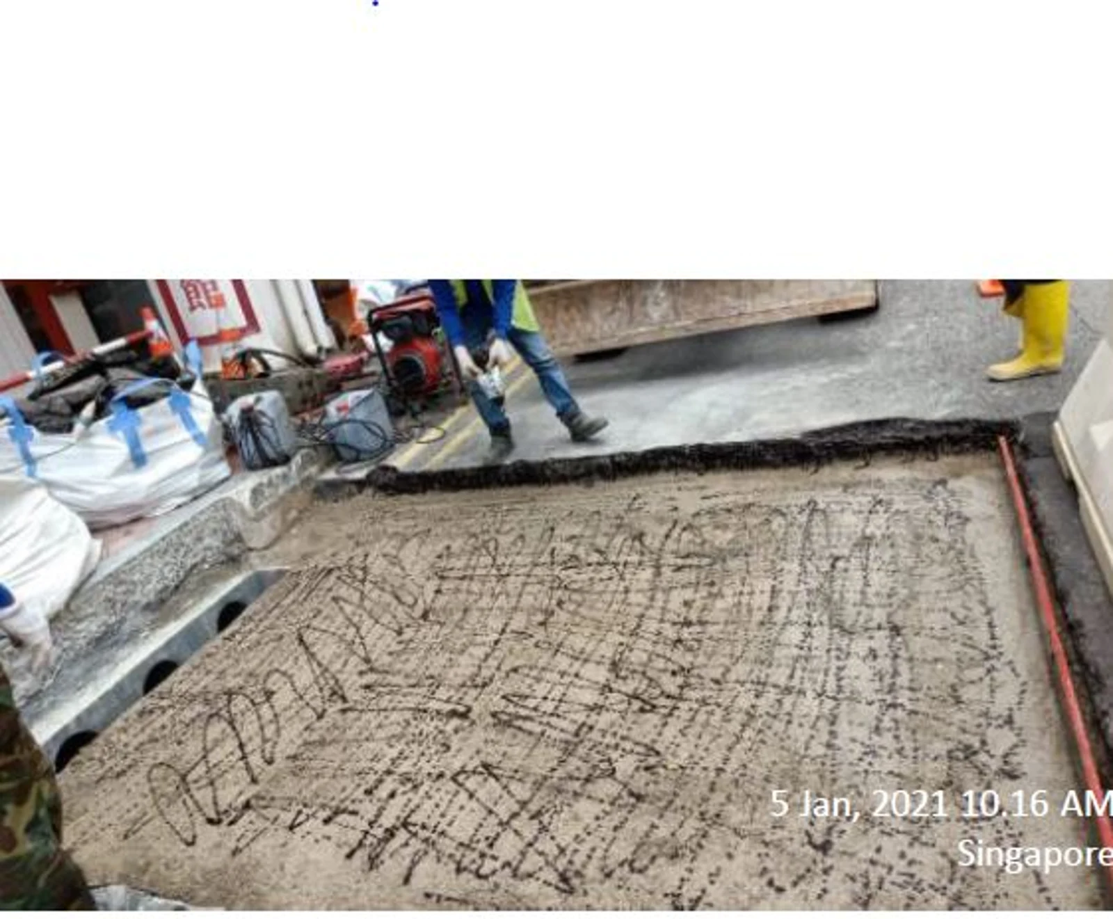 Figure 13: Applying Tack coat on the cement