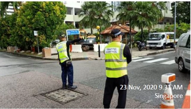 Figure 16: Auxiliary Police officers controlling traffic